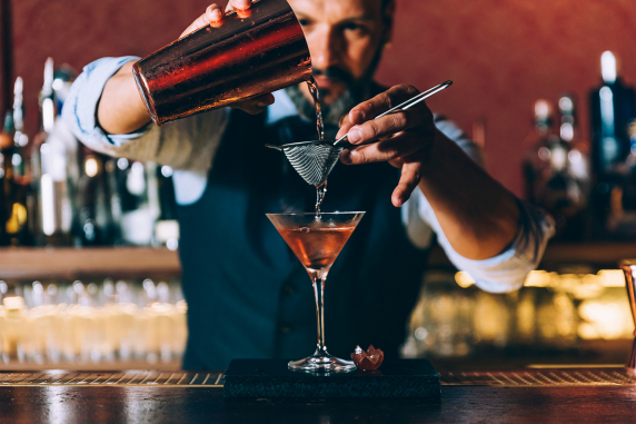 Barman making cocktails